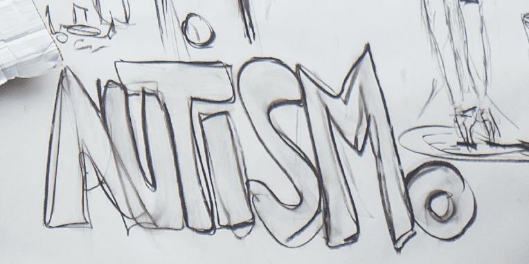 Dibujo a mano de la palabra autismo.